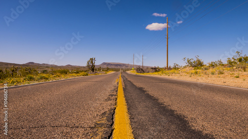 Long and empty lonesome road through Arizona