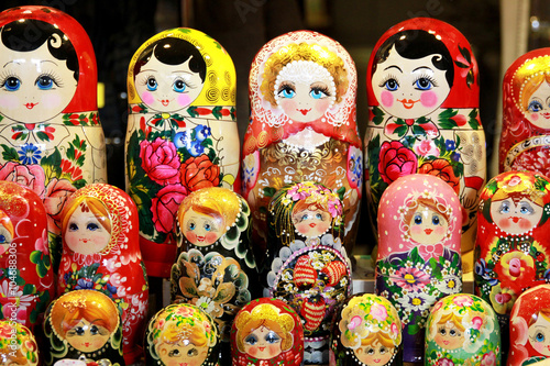 Russian toy matrioska dolls in row as a background