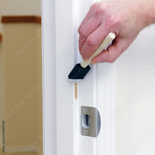 Painting Chipped off Area on a Door Frame