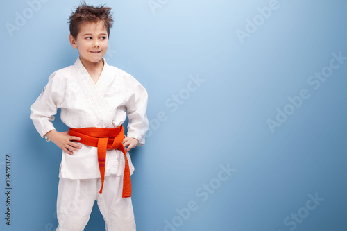 Boy in karate costume. photo