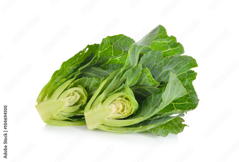 half cut fresh baby Chinese kale on white background half cut fresh baby Chinese kale on white background