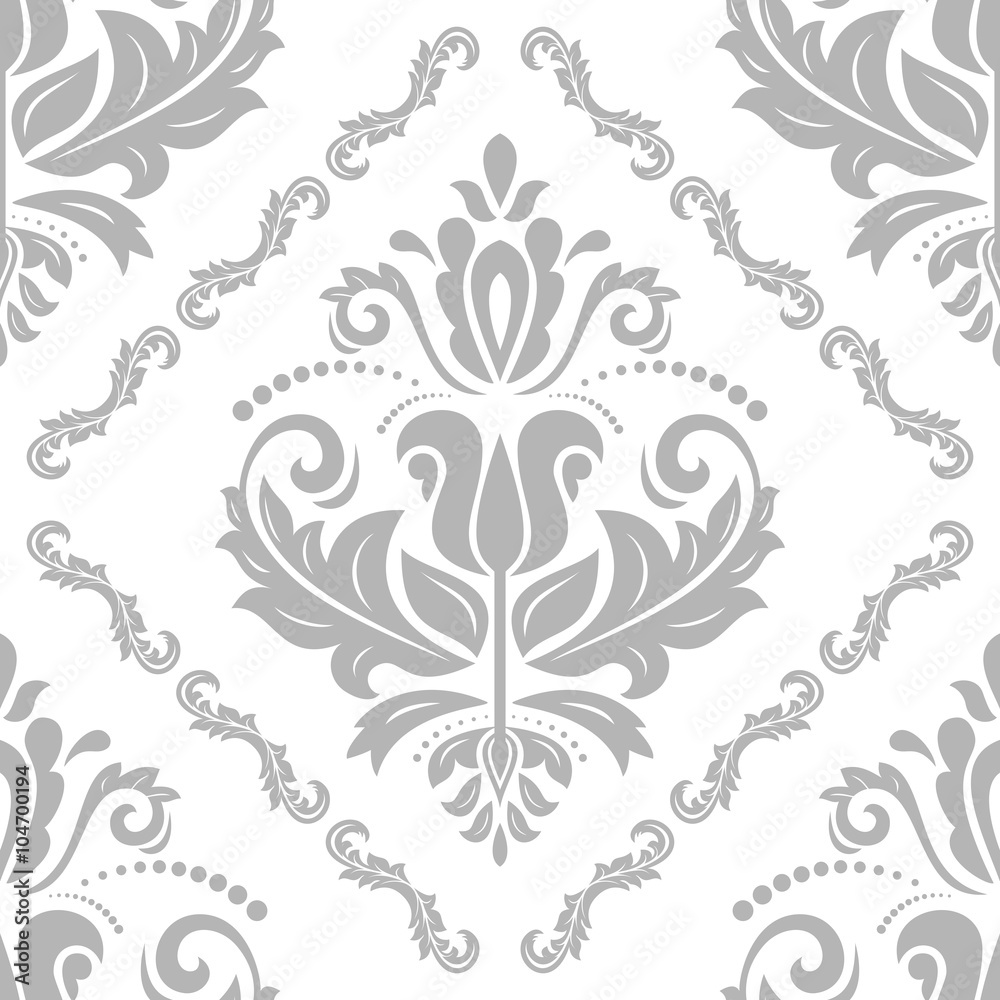 Damask seamless ornament. Traditional pattern. Classic oriental light silver background