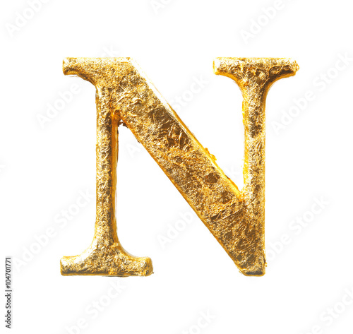 Alphabet and numbers in gold leaf photo