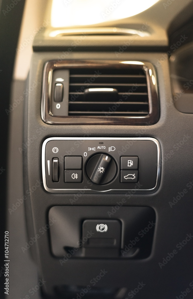 Modern car headlight controls.