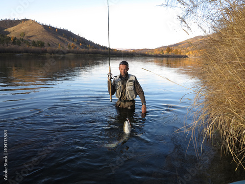 Fishing - taimen fishing in Mongolia photo