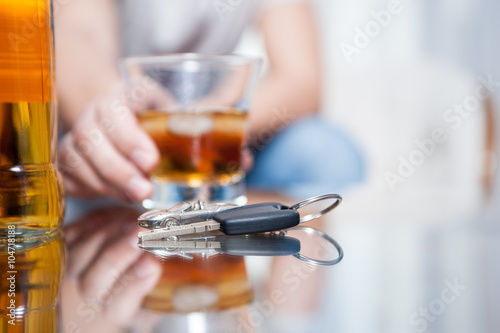 car keys and alcohol / Car keys on the table while drinking alcohol / if you drink alcohol don't drive
