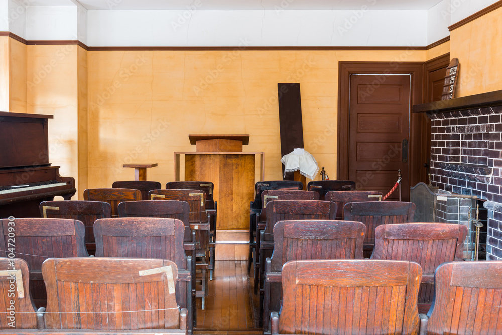 Empty witness chair inside a classic American courtroom. Empty witness chair inside a classic American courtroom.