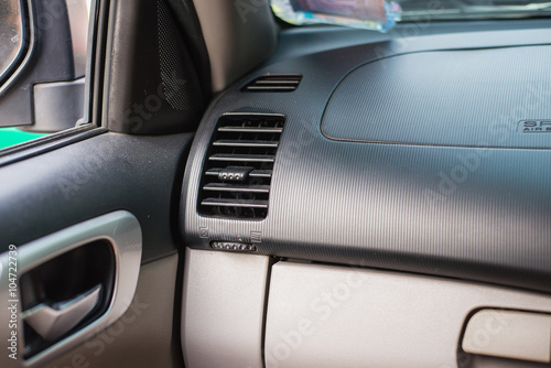 Car air conditioning system. Auto interior detail.