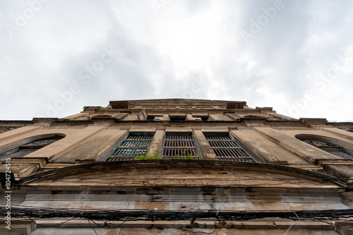 old europe style building facade with white cloud