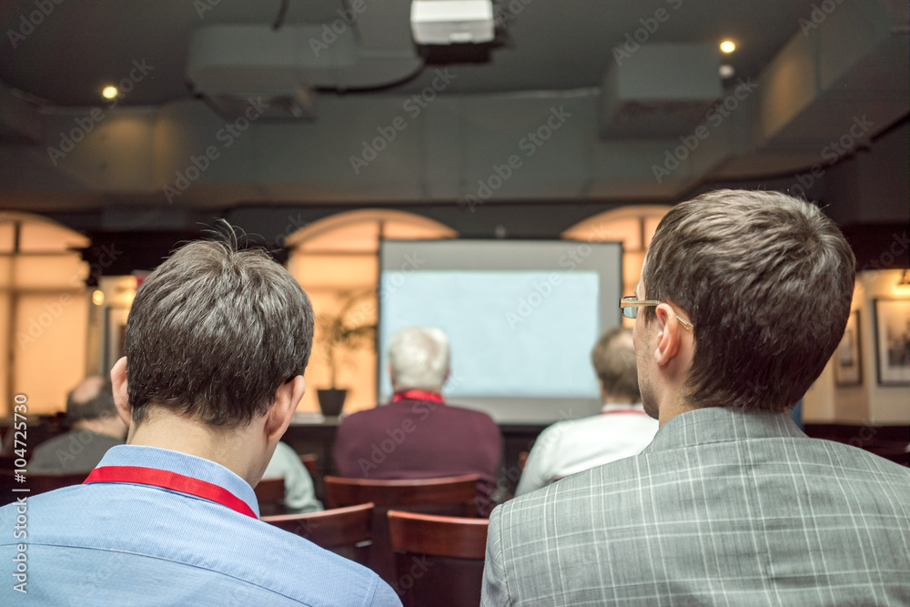 Audience at a conference presentation. Audience at a conference presentation.