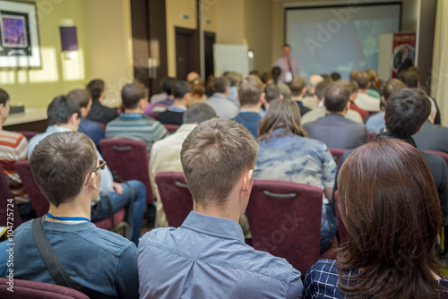 Meeting in a conference hall.