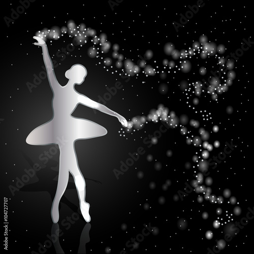 Silver ballerina on dark background.