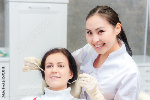 Female patient with open mouth photo