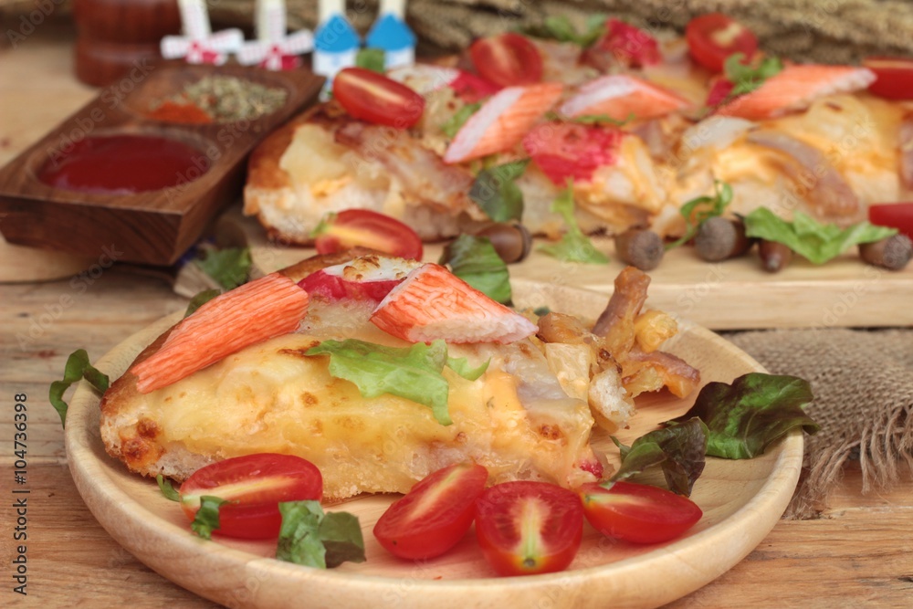 Italian pizza is delicious on wood background. Italian pizza is delicious on wood background.