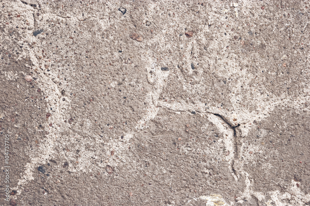 Abandoned concrete wall with cracks texture