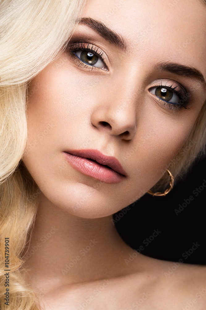 Obraz premium Beautiful blond woman with evening make-up, tender lips and curls. Beauty face.