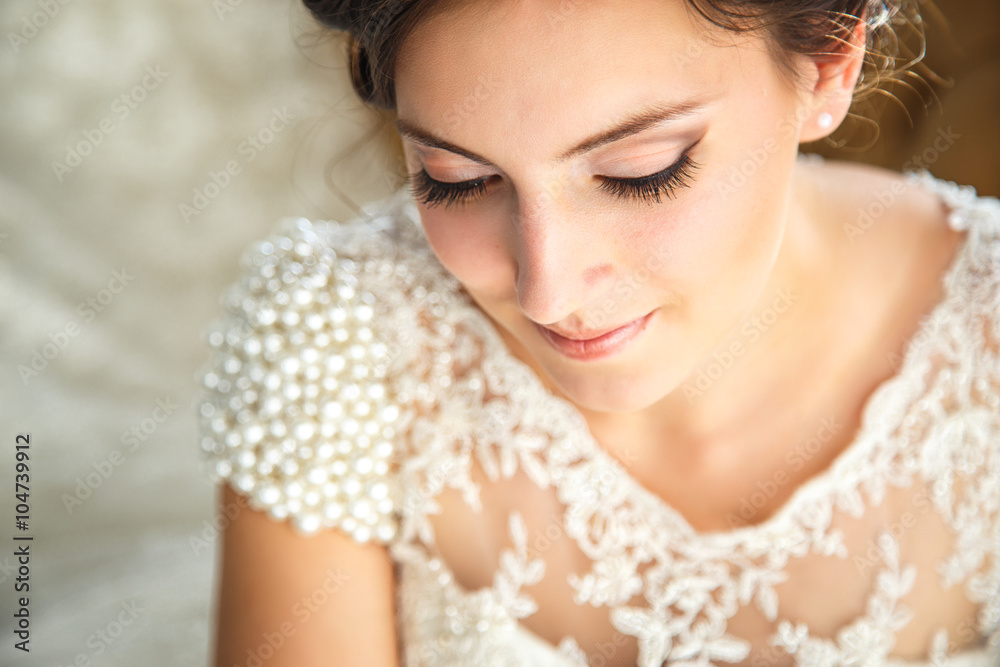 beautiful brunette bride in a luxurious wedding dress in elegant expensive interior beautiful brunette bride in a luxurious wedding dress in elegant expensive interior