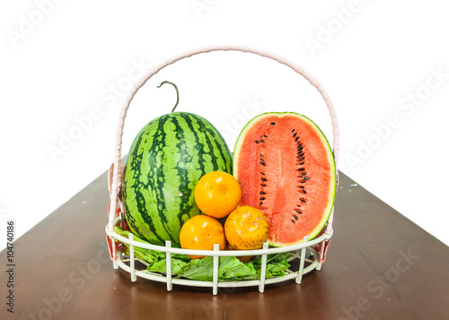 red and yellow watermelon and orange delicious fruit on the table