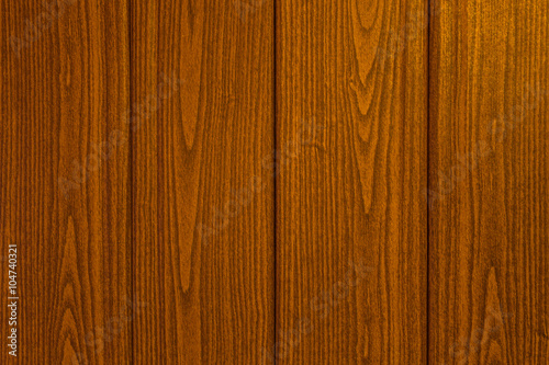 Wooden planks arranged vertically. Textured background