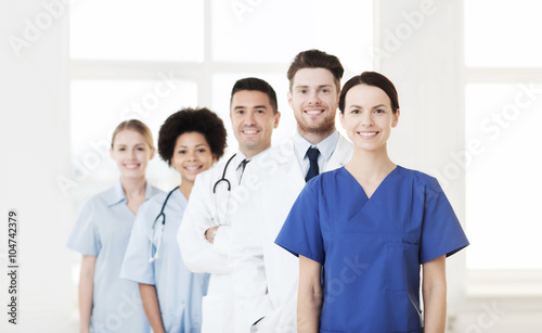 group of happy doctors at hospital