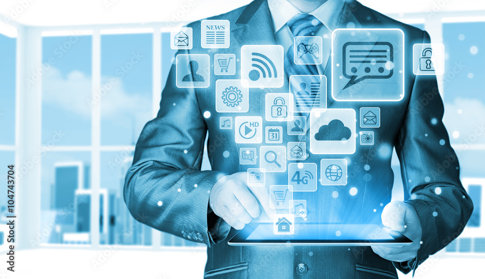 Business man using tablet PC with social media icon set Business man using tablet PC with social media icon set