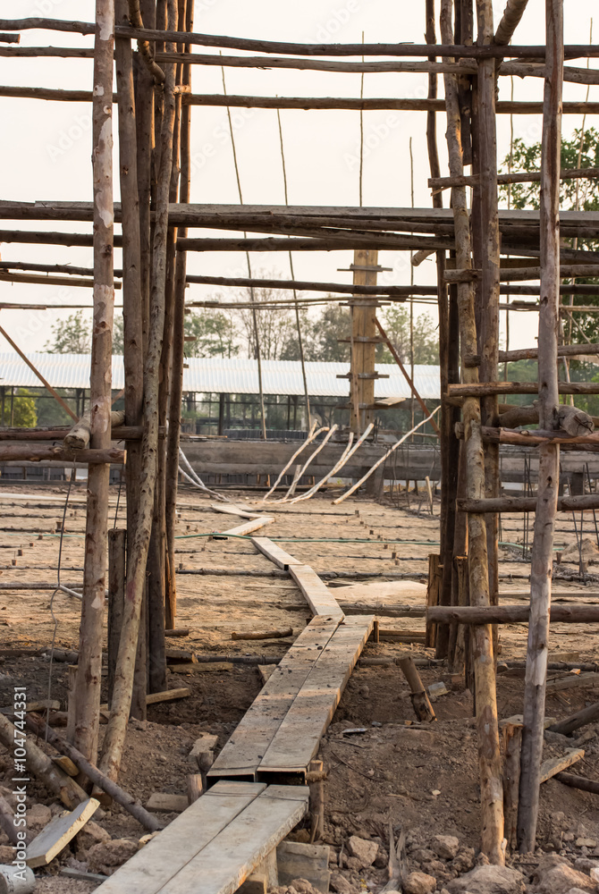 construction site of concrete building with wooden frames construction site of concrete building with wooden frames