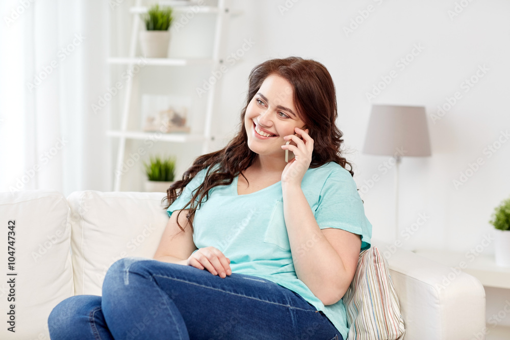 plus size woman calling on smartphone at home plus size woman calling on smartphone at home