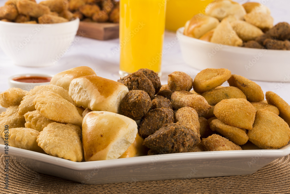 Mixed brazilian snack on the table.