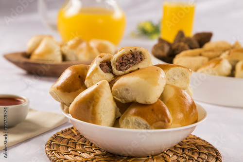 Brazilian snack. Meat Esfiha portion. photo