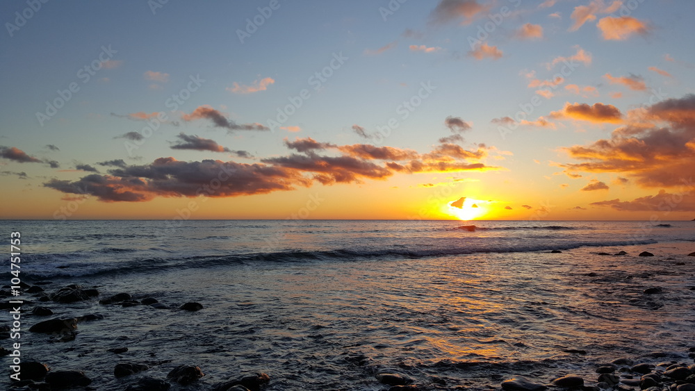 Obraz premium Zachód słońca i morze