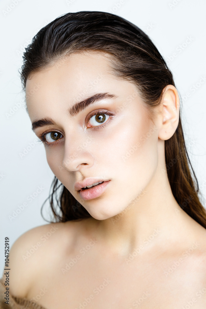 Beautiful Young Woman with Clean Fresh Skin close up isolated on white. Beauty Girl Portrait. Spa Woman Smiling. Perfect Fresh Skin. Face Model. Youth and Skin Care Concept Beautiful Young Woman with Clean Fresh Skin close up isolated on white. Beauty Girl Portrait. Spa Woman Smiling. Perfect Fresh Skin. Face Model. Youth and Skin Care Concept