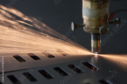 industrial Laser cutting process with sparks