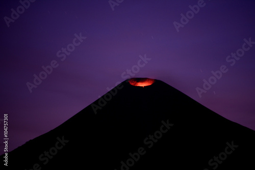 Volcano crater at night photo