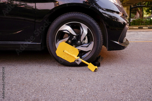 Clamped vehicle, wheel locked