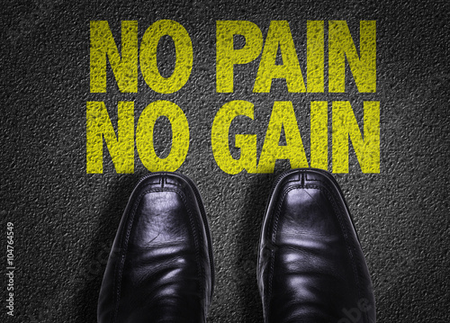 Photo Top View of Business Shoes on the floor with the text: No Pain No Gain