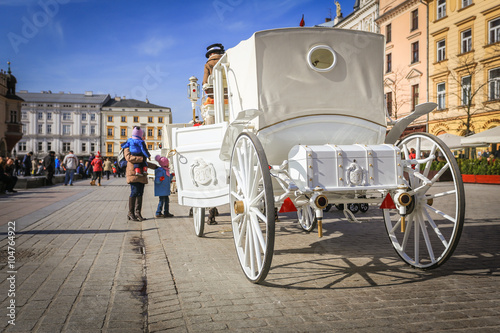 Фотография Hansom cab on the old city in Krakow