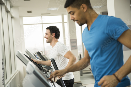 Young multiracial men in the gym
