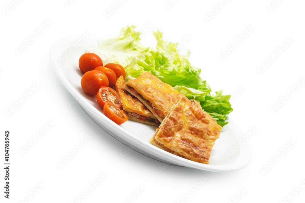 Homemade Spanish empanada filled with tuna fish and red pepper Homemade Spanish empanada filled with tuna fish and red pepper