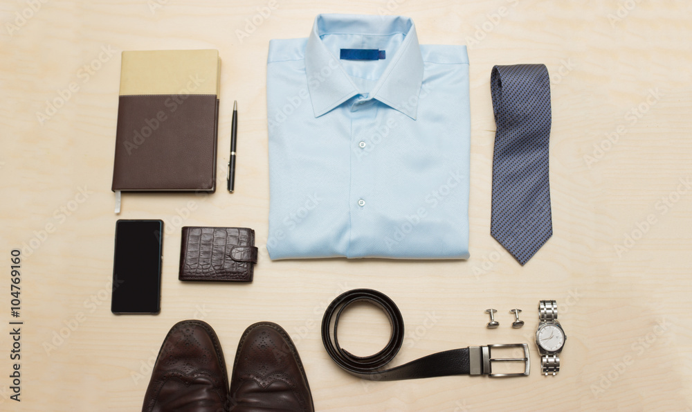 Men's classic outfit with blue shirt, tie and accessories - obrazy, fototapety, plakaty 