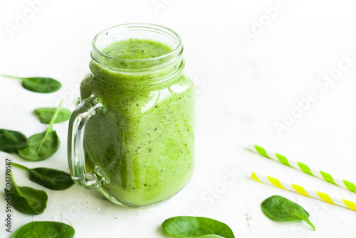 Healthy green smoothie in jar.