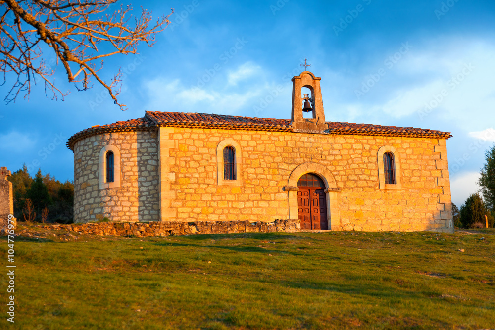 Hermitage near Santo Domingo de Silos town at sunset, province of Soria, Spain