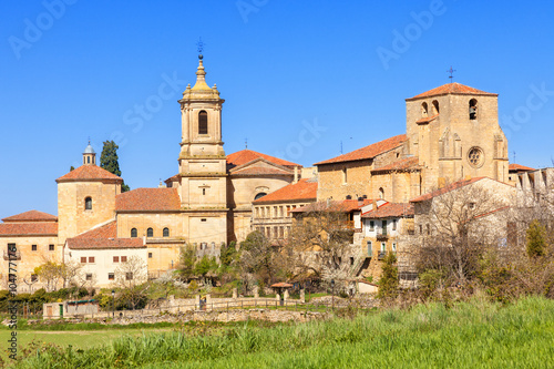 Monastery of Santo Domingo de Silos in the province of Burgos, Spain. St. Peter church on the right photo