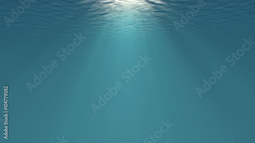 Lightrays Shining through Deep Ocean Water Surface