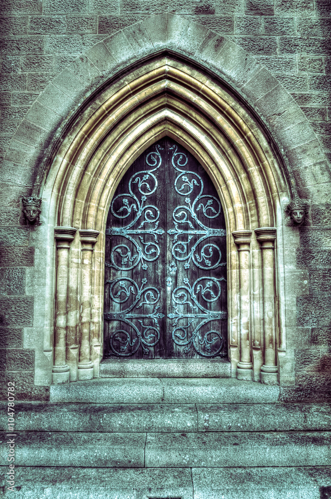 Fototapeta premium Old arched doors richly decorated HDR