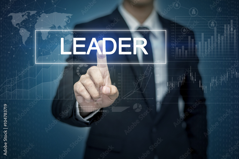 Businessman hand touching LEADER button on virtual screen Businessman hand touching LEADER button on virtual screen