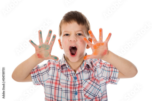 Little boy with paint stained hands
