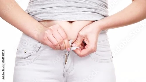 Woman with belly fat unable to close the pants 4K