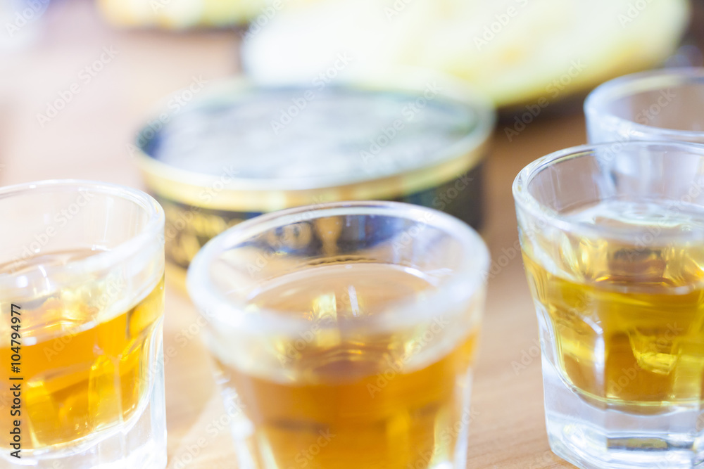 Alcohol shot glass on a table Alcohol shot glass on a table