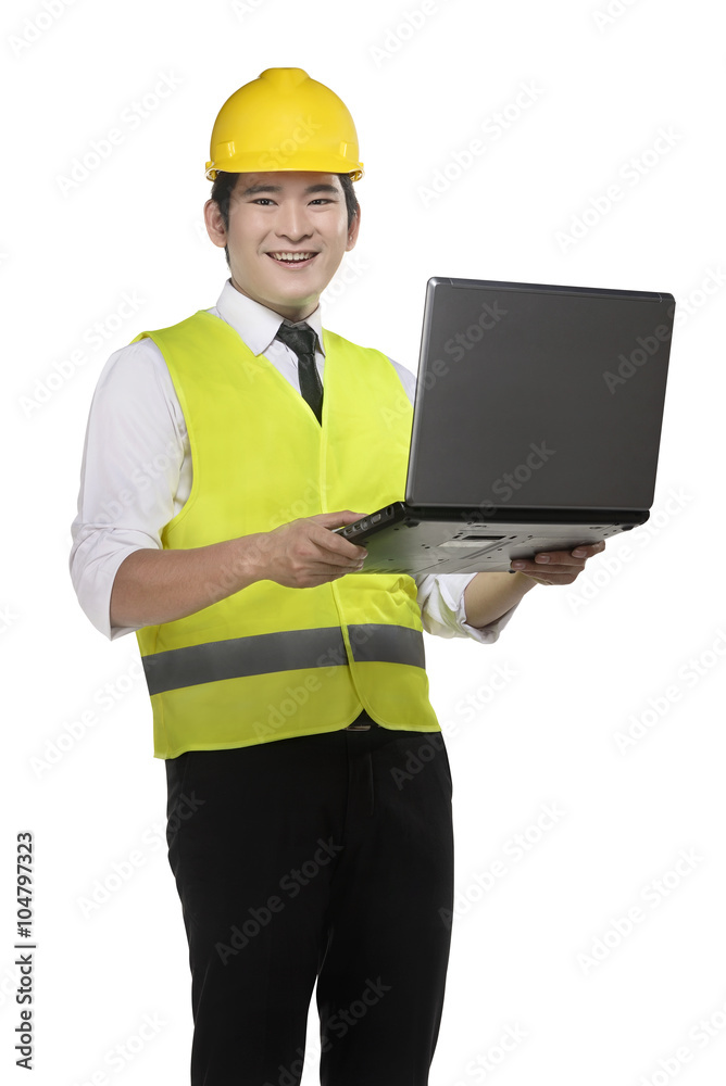 Asian worker wearing safety vest and yellow helmet Asian worker wearing safety vest and yellow helmet