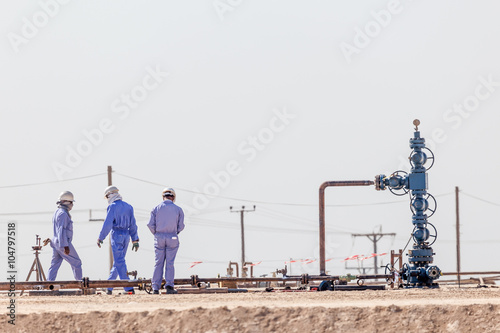 Workers at a borehole